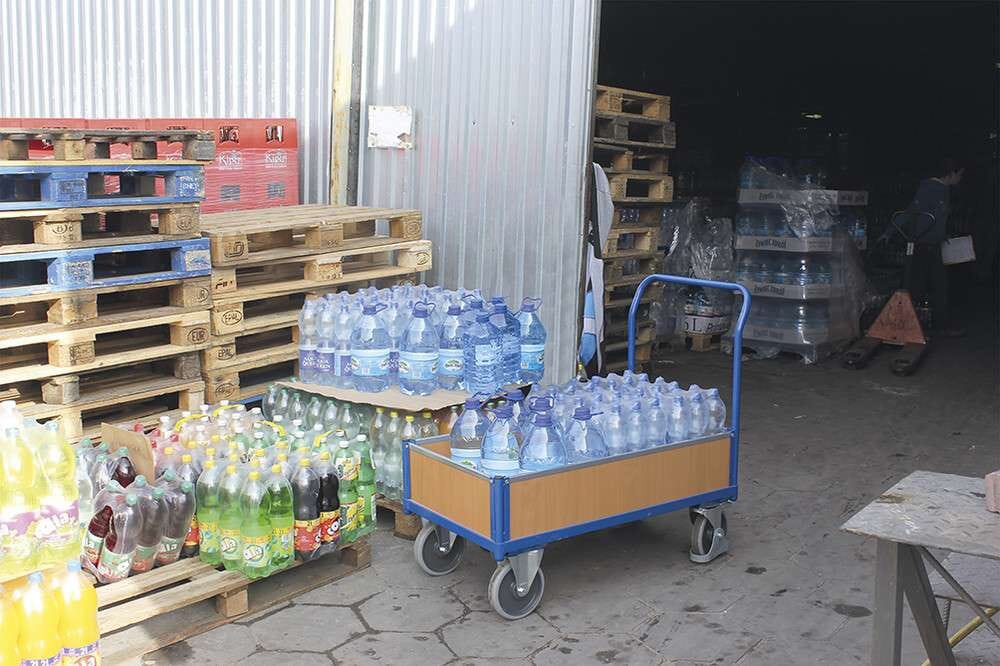 Chariot à 4 côtés avec plateau mélaminé